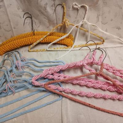 lot of vintage crochet covered clothes hangers