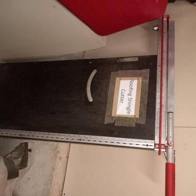 Roofing shingle cutter