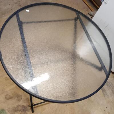 round outdoor glass top table