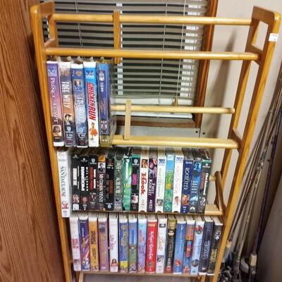 VHS tapes and wooden stand