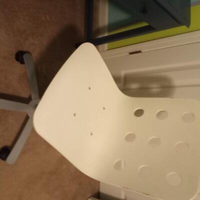 White plastic rolling office chair