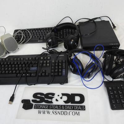 2 KeyBoards, DVD Player, Mouse, Numpad, 1 Gaming Headset, 2 Headphones, Speakers