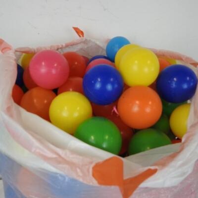 Kitchen Bag Full of Click N' Play Plastic Balls For a Ball Pit