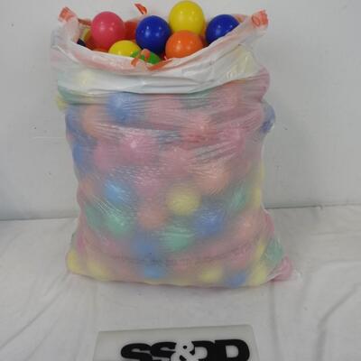 Kitchen Bag Full of Click N' Play Plastic Balls For a Ball Pit