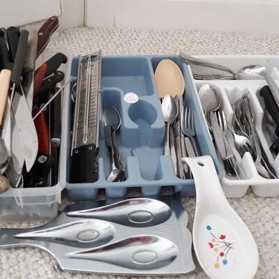 Lot  of Kitchen Utensils and Spoon rests.