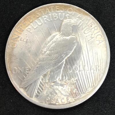 Lot 212: Three Silver Peace Dollars & One Silver Walking Liberty Half Dollar