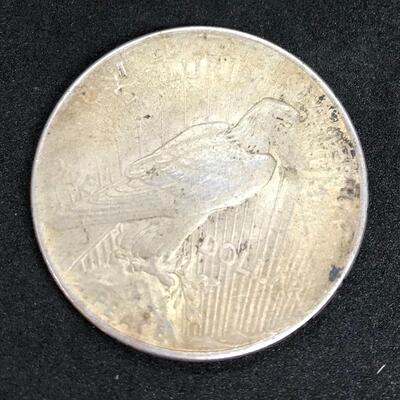 Lot 212: Three Silver Peace Dollars & One Silver Walking Liberty Half Dollar