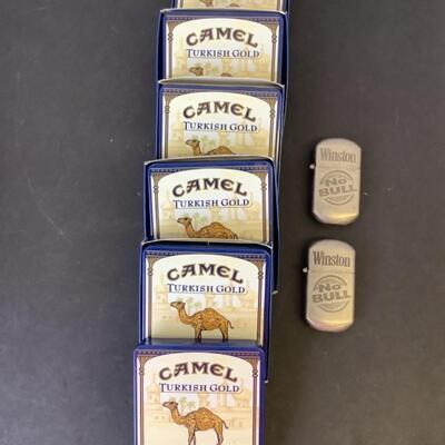 A - 356  Collection of Blue, Camel Cigarette Tin Boxes & Two Winston â€œ No. Bull â€œ Tobacco Lighters