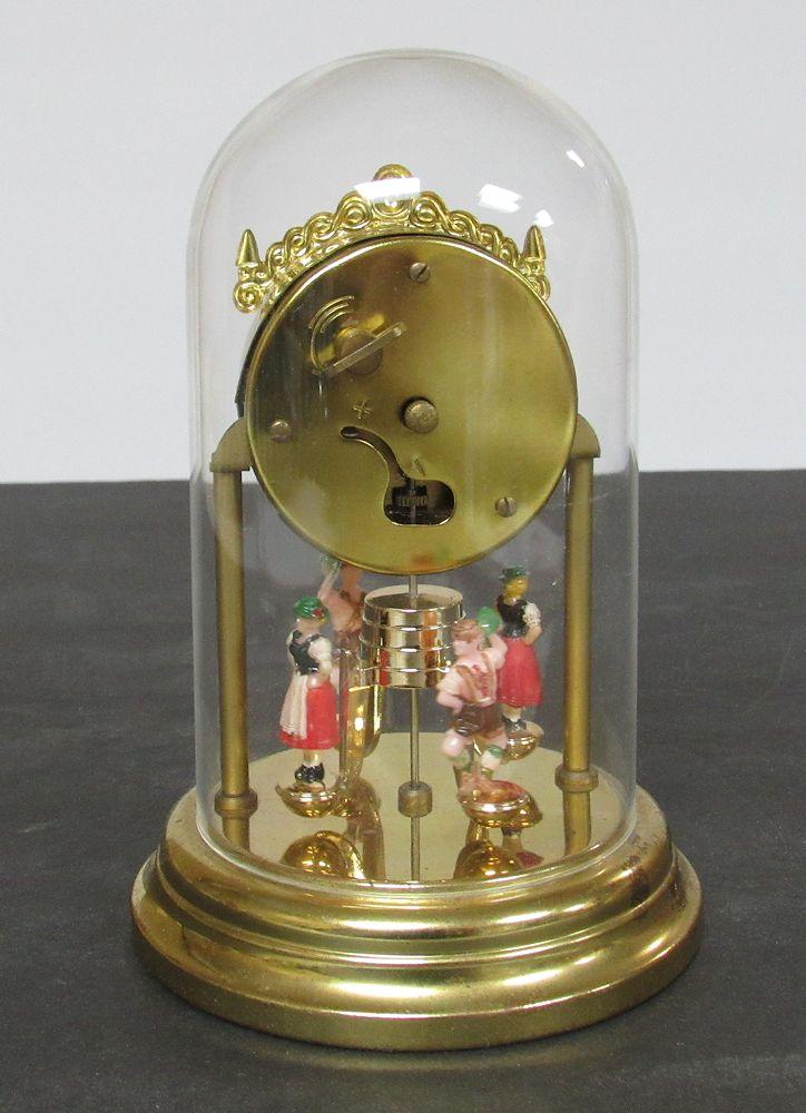 West German Wind Up Clock German Figures Spin, With Glass Dome