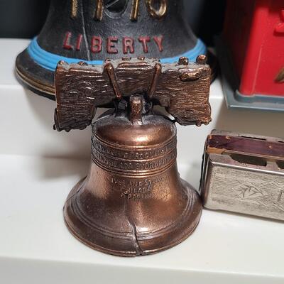 Lot 789: Vintage Liberty Bell Bank and Uncle Sam Bank