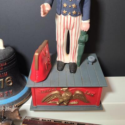 Lot 789: Vintage Liberty Bell Bank and Uncle Sam Bank
