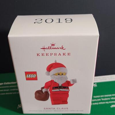 Lot 751: Hallmark Lego Santa Claus & Dept 56 Lego Sets