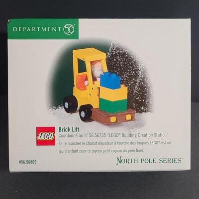 Lot 751: Hallmark Lego Santa Claus & Dept 56 Lego Sets
