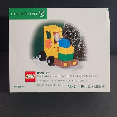 Lot 751: Hallmark Lego Santa Claus & Dept 56 Lego Sets