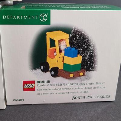 Lot 751: Hallmark Lego Santa Claus & Dept 56 Lego Sets