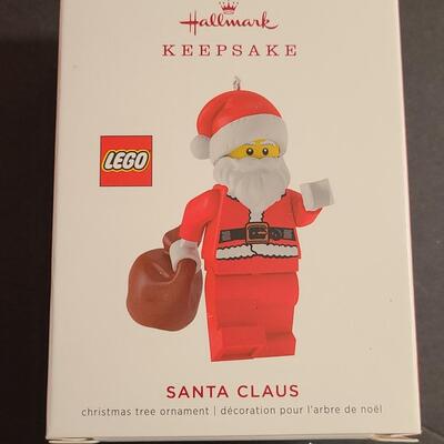 Lot 751: Hallmark Lego Santa Claus & Dept 56 Lego Sets