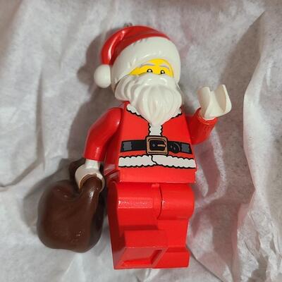 Lot 751: Hallmark Lego Santa Claus & Dept 56 Lego Sets