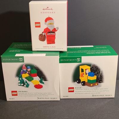 Lot 751: Hallmark Lego Santa Claus & Dept 56 Lego Sets