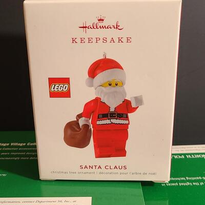 Lot 751: Hallmark Lego Santa Claus & Dept 56 Lego Sets