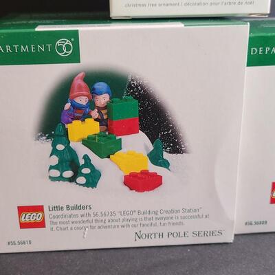 Lot 751: Hallmark Lego Santa Claus & Dept 56 Lego Sets