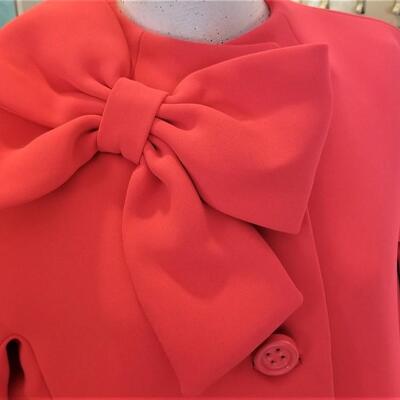 Lot #184  Lovely KATE SPADE coat with signature bow