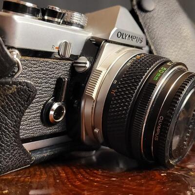 Lot 12: Vintage OLYMPUS 35mm OM-1 Camera w/ 50mm Lens & Original Travel Case