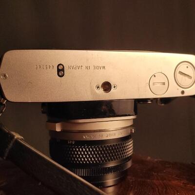 Lot 12: Vintage OLYMPUS 35mm OM-1 Camera w/ 50mm Lens & Original Travel Case