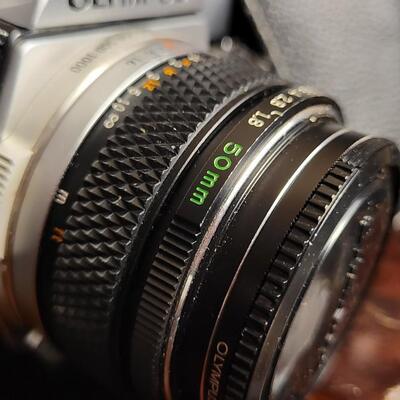 Lot 12: Vintage OLYMPUS 35mm OM-1 Camera w/ 50mm Lens & Original Travel Case