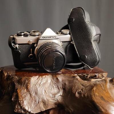 Lot 12: Vintage OLYMPUS 35mm OM-1 Camera w/ 50mm Lens & Original Travel Case
