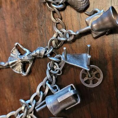 Lot 38: Vintage Sterling Charm Bracelet