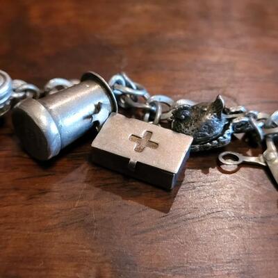 Lot 38: Vintage Sterling Charm Bracelet