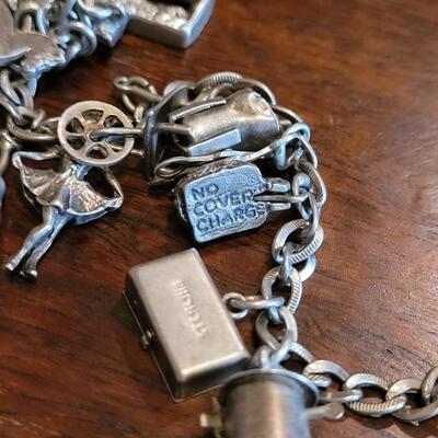 Lot 38: Vintage Sterling Charm Bracelet