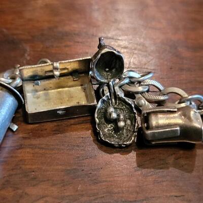 Lot 38: Vintage Sterling Charm Bracelet