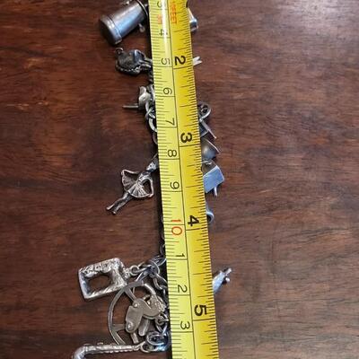 Lot 38: Vintage Sterling Charm Bracelet
