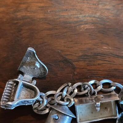 Lot 38: Vintage Sterling Charm Bracelet