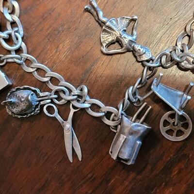 Lot 38: Vintage Sterling Charm Bracelet