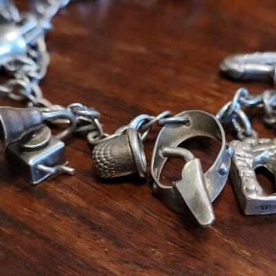 Lot 38: Vintage Sterling Charm Bracelet
