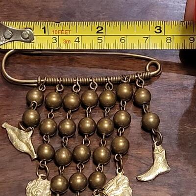 Lot 45: Vintage Brass Mexican Milagros Charm Brooch