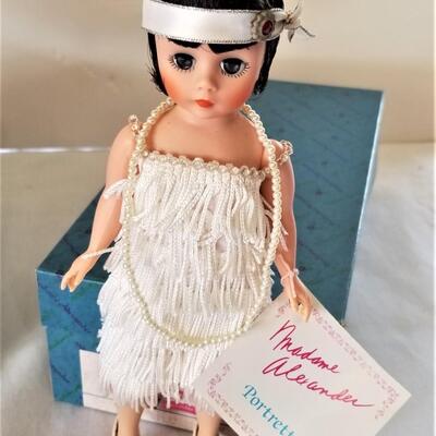 Lot #217  Lot of 2 Madame Alexander Dolls - Beth (Little Women) and Flapper