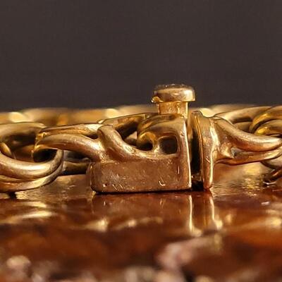 Lot 119: Vintage 8" 14k Yellow Gold Braided Charm Bracelet w/ Push Clasp