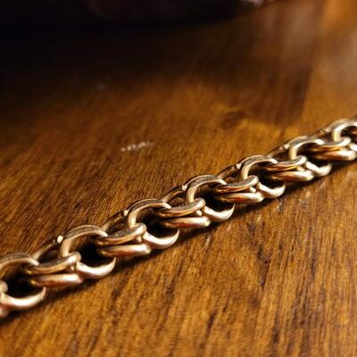Lot 119: Vintage 8" 14k Yellow Gold Braided Charm Bracelet w/ Push Clasp