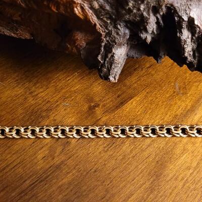 Lot 119: Vintage 8" 14k Yellow Gold Braided Charm Bracelet w/ Push Clasp