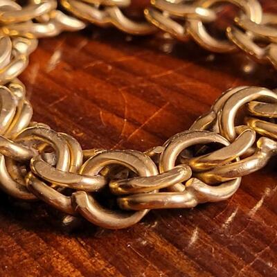 Lot 119: Vintage 8" 14k Yellow Gold Braided Charm Bracelet w/ Push Clasp