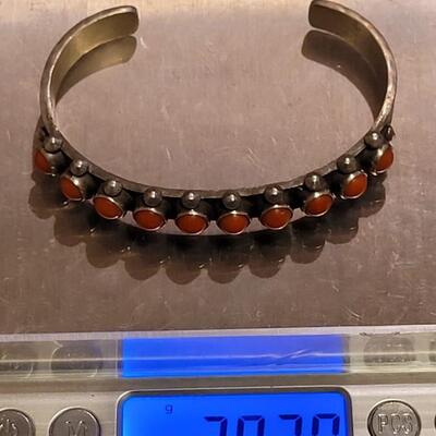 Lot 153: Navajo Sterling & Coral Stamped Cuff Bracelet
