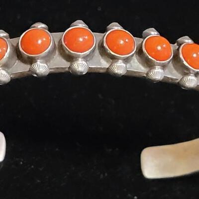 Lot 153: Navajo Sterling & Coral Stamped Cuff Bracelet