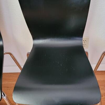 Lot 199: (4) Mid Century Black Chairs