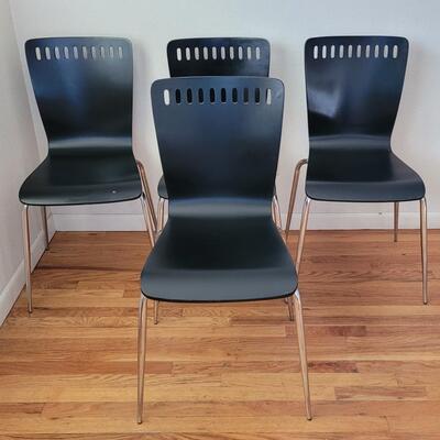 Lot 199: (4) Mid Century Black Chairs