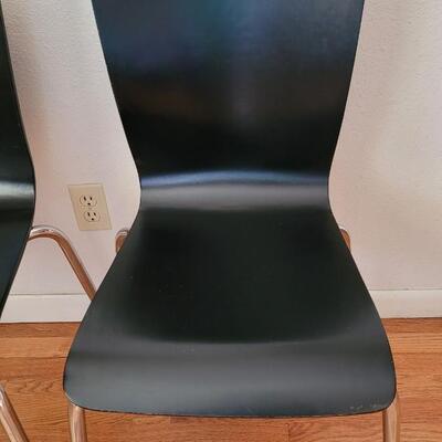 Lot 199: (4) Mid Century Black Chairs