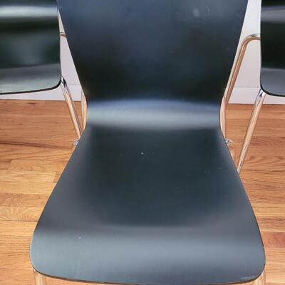 Lot 199: (4) Mid Century Black Chairs