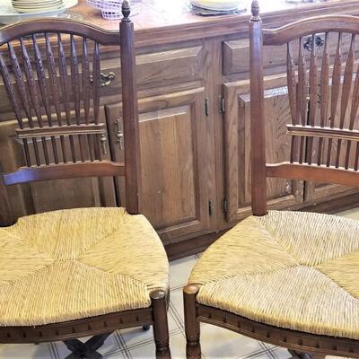 Lot #243  Group of 4 Arrowback Chairs - Rush Seats